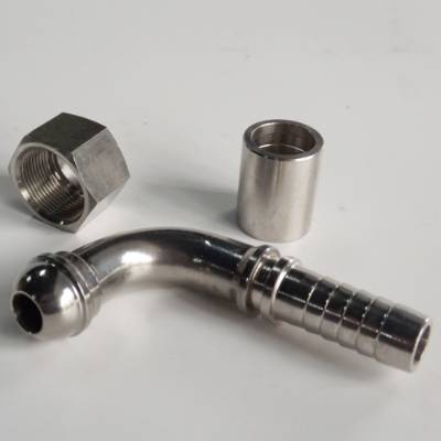 Female multiseal fitting with nut and ferrule on gray background