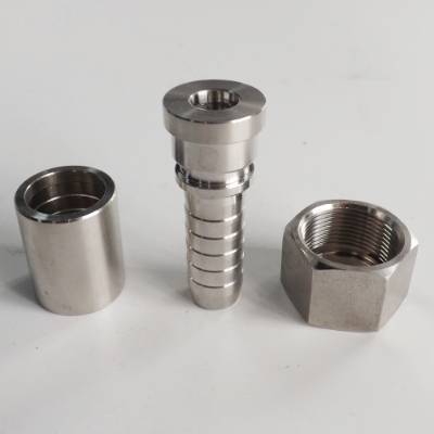 Interlock flat seal fitting, nut and ferrule on the gray background
