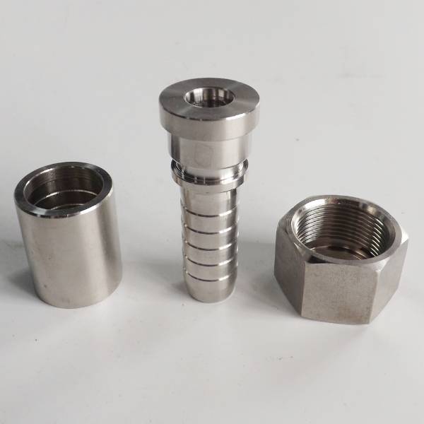 Interlock flat seal fitting with nut and ferrule on the gray background